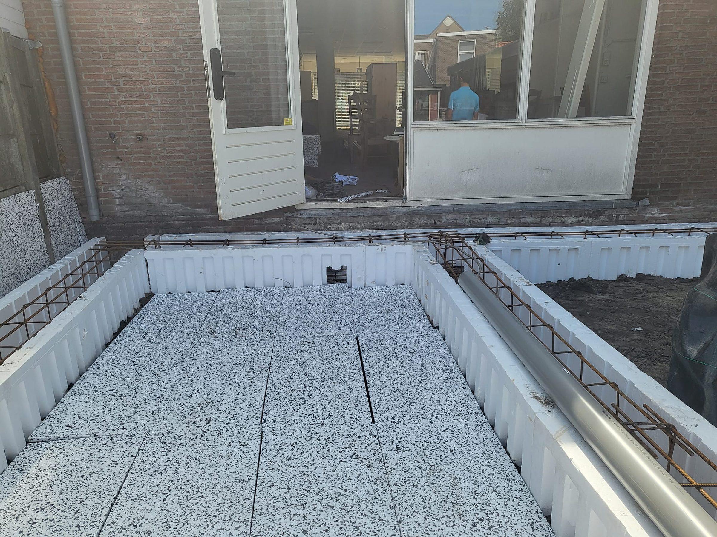 Strak afgewerkte achtertuin na verbouwing.